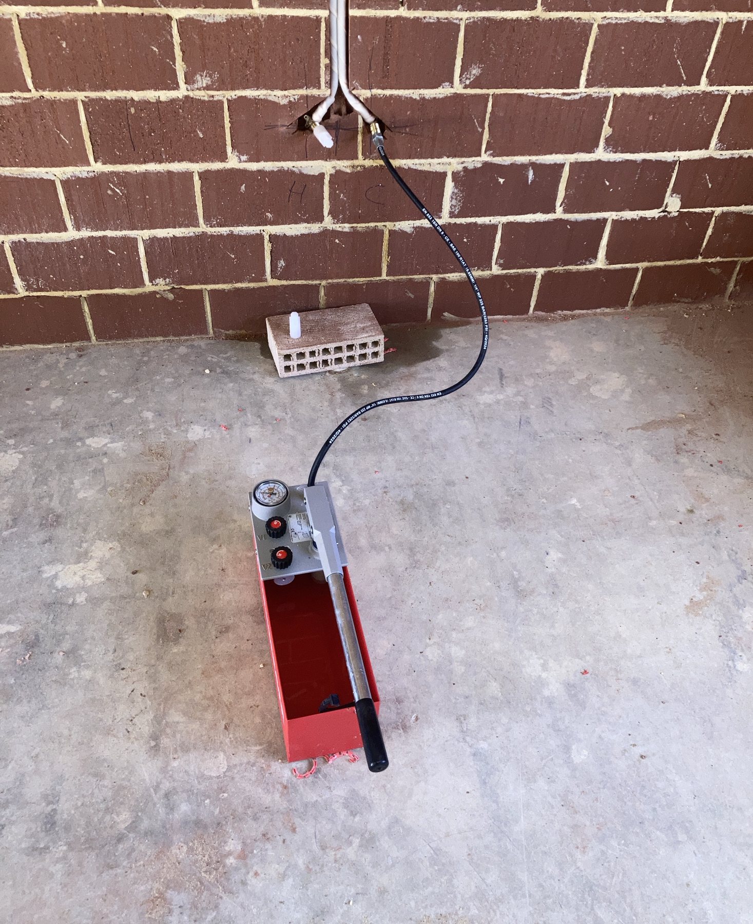 Hydrostatic pressure test gauge fitted to a completed pipework run.